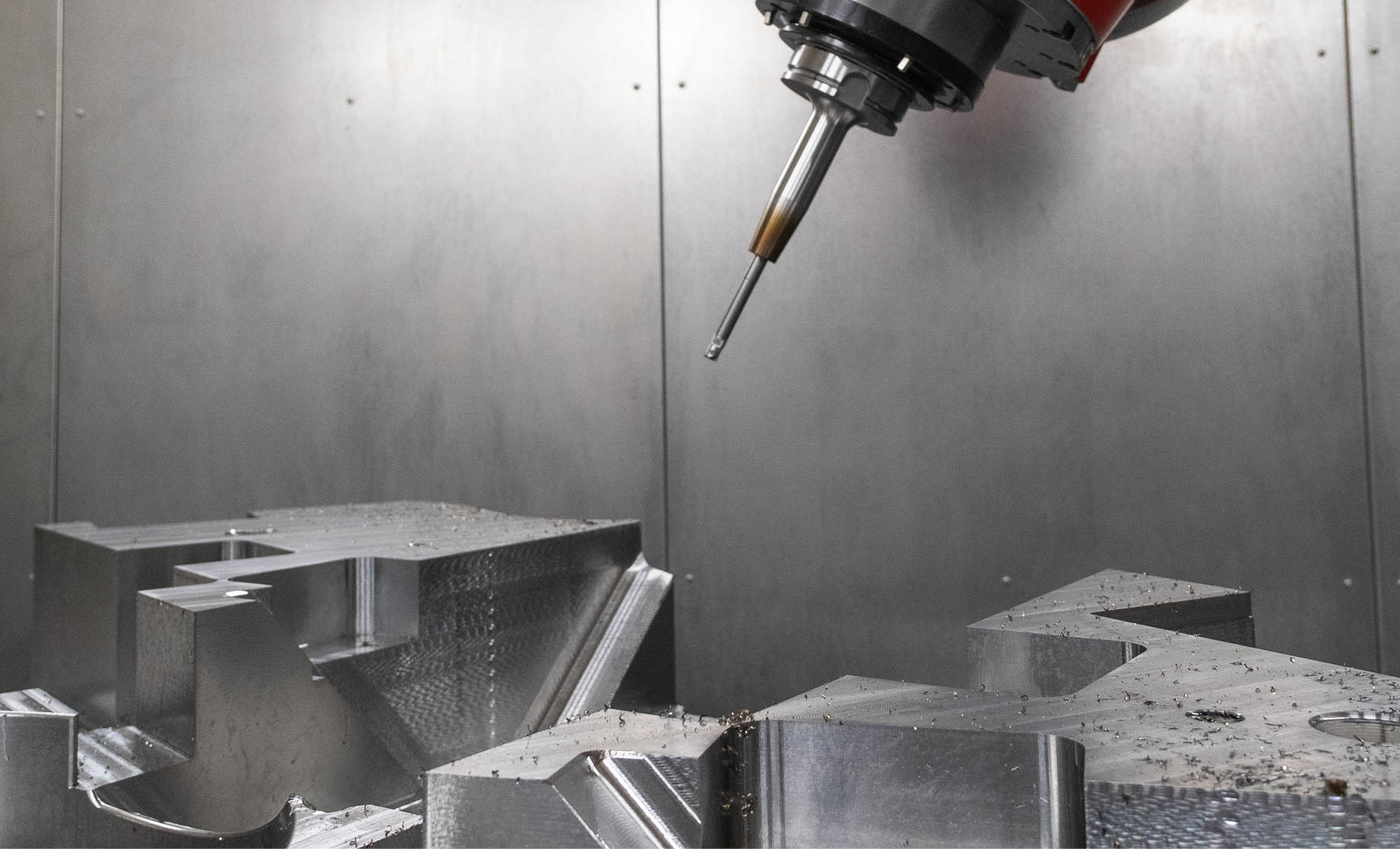 High precision CNC machining center producing industrial tool plates and components | HTS MWT